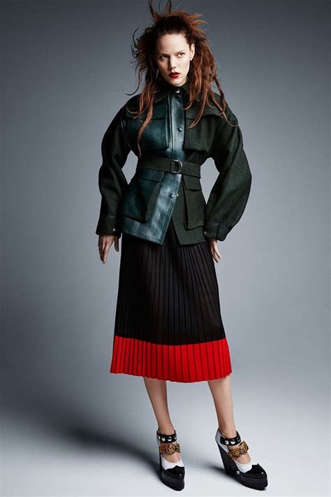 The Brunette Model Wears Celine Wool And Leather Jacket With Pleated