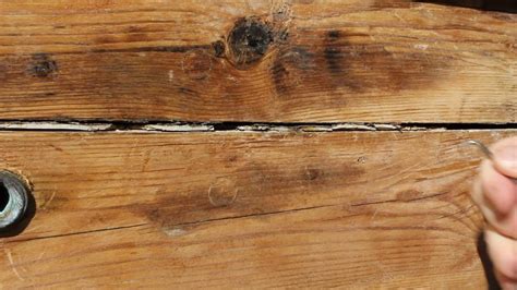 How do you fix cracked window putty? Removing cracked caulking from boat planking - YouTube