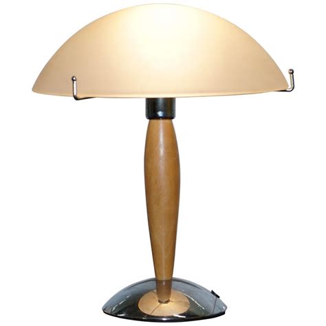 This floor lamp features an open metal base in a solid black finish. Cool Mid-Century Modern Style Table Lamp with Opalescent ...