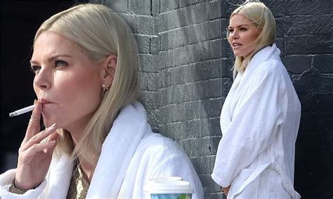 Sophie Monk Takes A Smoke Break In Ugg Boots And A Dressing Gown