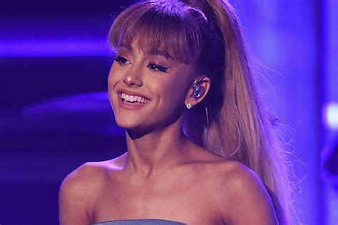 Ariana Grande Rocks Blonde Half Up Top Knot Style For Faith Music Video