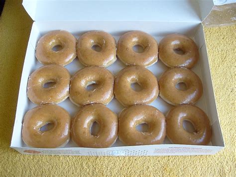 Be sure to enter your birthday when you register so they'll know when to send the coupon. Fil:Krispy Kreme Dozen Doughnuts 2.jpg - Wikipedia