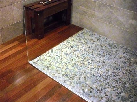 Adding floor tiles to your bathroom can not only provide you with a durable, hardwearing surface, but also help you achieve your ideal bathroom vibe. Pebble Tile Stone Pattern Vinyl Flooring Modern House ...