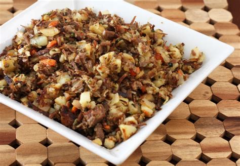 A combination of corned beef, potatoes, and onions. Leftover Corned Beef Hash With Cabbage Recipe