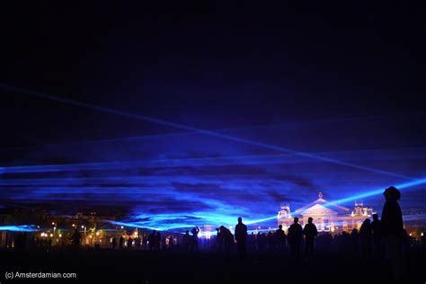 Amsterdam's most famous museums cluster around this public square, which has that amsterdam essential: A sea of lasers flooding Museumplein | Amsterdamian