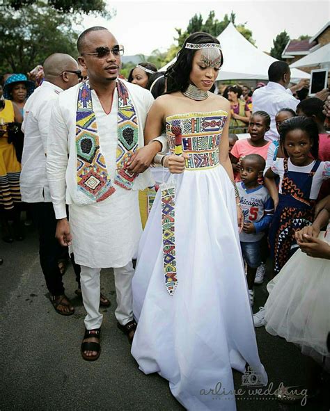 Ndebele women traditionally adorned themselves with a variety of ornaments, each symbolising her status in society. traditional ndebele wedding | African traditional wedding, African traditional dresses ...