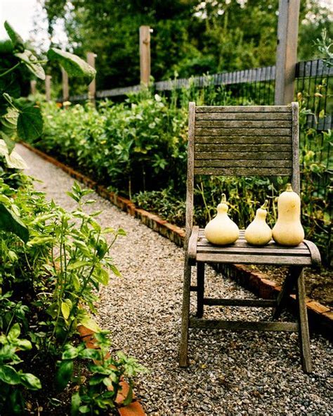 Let them flop over the sides of the path to create a full, lush look. Garden Photos | Pebble garden, English garden design ...