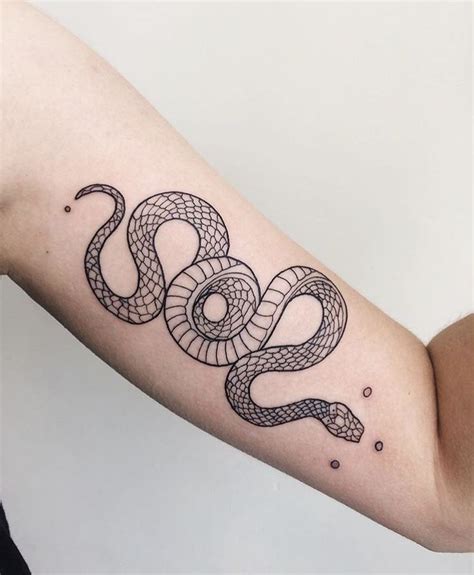 Before you get a snake tattoo, learn more about the snake as a symbol, know its history, understand its various meanings across cultures, and look at lots of snake tattoo photos. Snake Tattoo - Snake Tattoo - - #Schlangen #Tattoo - # ...