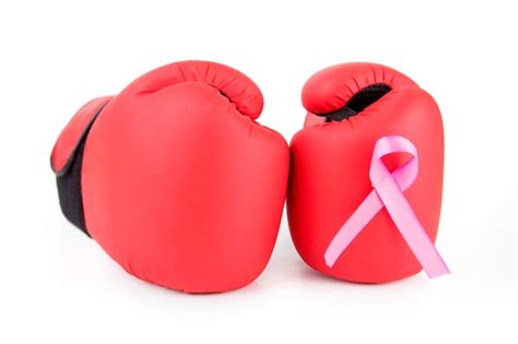 Premium Photo Pair Of Boxing Gloves With Pink Ribbon Attached To