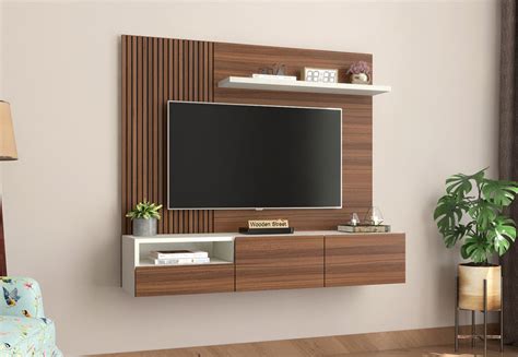 When we are sitting in our room, though, the tv will be a little higher so we don't have to duck our heads too much. Buy Hailey Wall-Mounted Tv Unit (Exotic Teak Finish ...