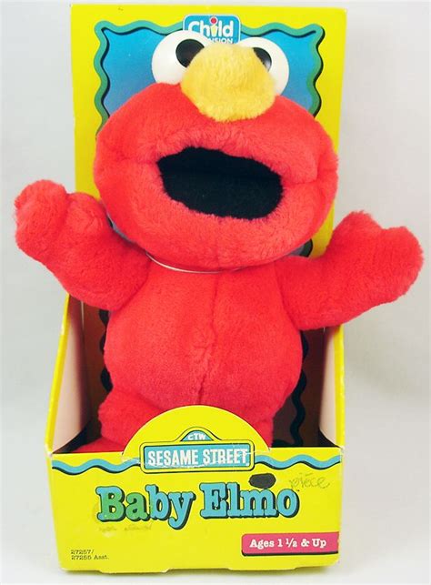 Sesame Street Child Dimension Baby Elmo Plush Doll