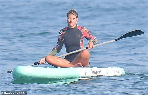 Sofia Richie Puts Her Curves On Display In A Wetsuit As She Paddle Boards With Friends In Malibu