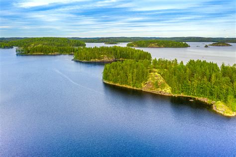 Aerial View Of Of Small Islands On A Blue Lake Saimaa Landscape With