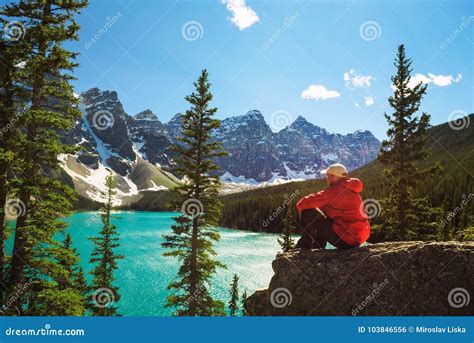 Hiker Enjoying The View Of Moraine Lake In Banff National Park Stock