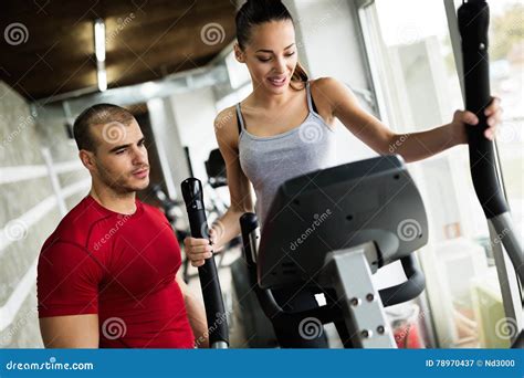 Personal Trainer Instructing Trainee Stock Image Image Of Leisure