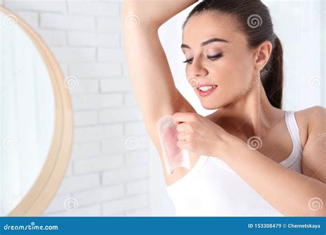 Woman Doing Armpit Epilation Procedure With Wax Strips Space For Text