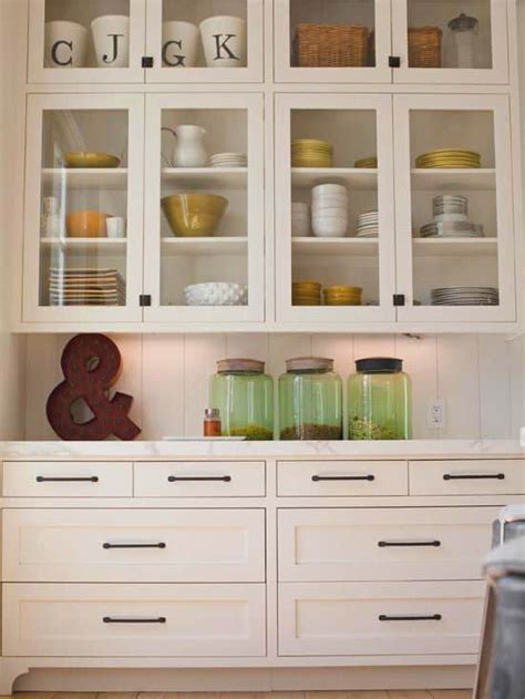 Glass doors let the light shine into your space, illuminating your space, ceramics, and dishware displays. 30 Gorgeous Kitchen Cabinets For An Elegant Interior Decor ...