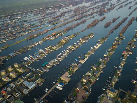 Aerial View Of Recreational Harbour For Small Boats And Bungalows On