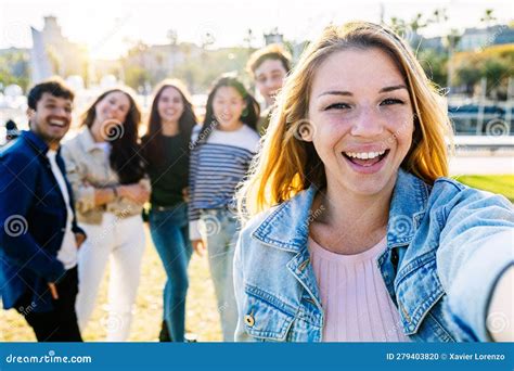 Happy Group Of Young Friends Having Fun Taking Selfie Portrait Together
