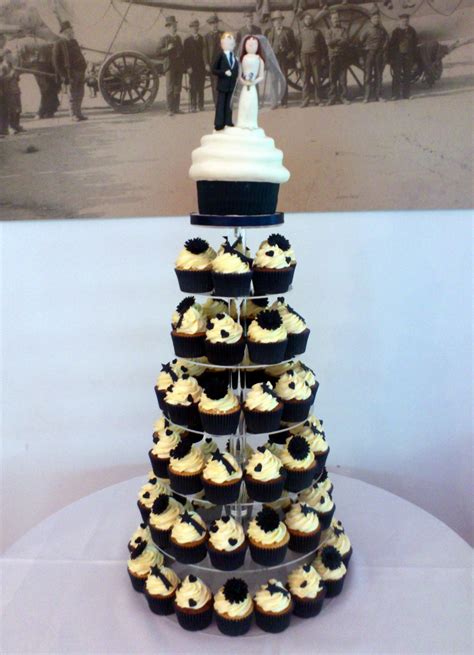 We did not find results for: Wedding Cupcake Tower with Giant Cupcake and Bride and ...