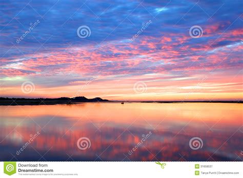 Vibrant Sunset Over Water Stock Image Image Of Colors