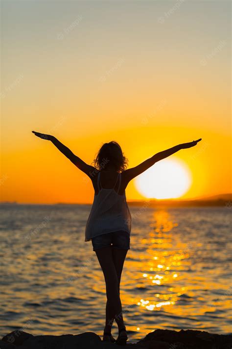 Premium Photo Strong Confidence Woman Open Arms Under The Sunrise At