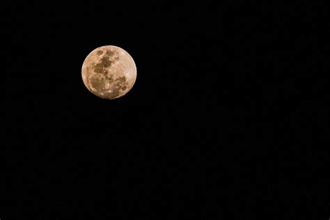 Ninety Nine Percent Full Moon In A Hazy Smoky Night Sky Photograph By Merrillie Redden Fine