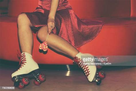 Person Holding Roller Skates Photos And Premium High Res Pictures