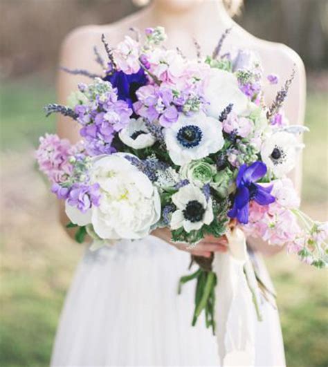 Perfect for an outdoor fall wedding, this bouquet features an assortment of wildflowers, roses, lilies, wallflowers, and hypericum. Garden Style Wedding Bouquets Archives - Weddings Romantique