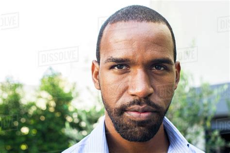 Man With Determined Expression Portrait Stock Photo Dissolve