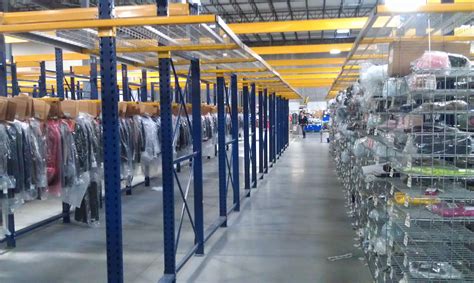 Clad rack warehouses is a compact storage solution. Garment on Hanger (GOH) Racks | Warehouse Design