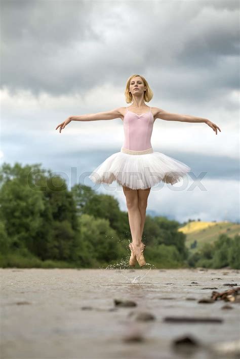 Ballerina Jumping Above River Stock Image Colourbox