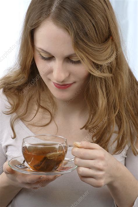 Woman Drinking Herb Tea Stock Image P9200650 Science Photo Library