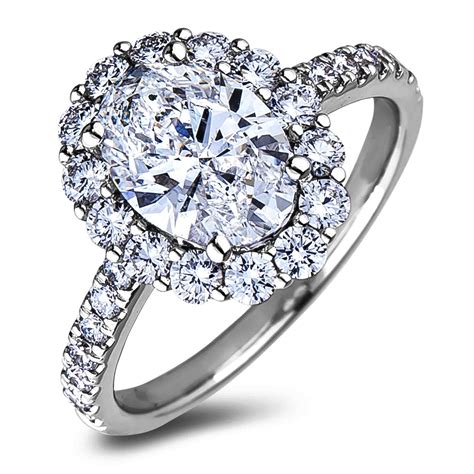 For example, elongated diamond shapes such as pear or oval may appear larger. 4 Carat Oval Diamond Halo Engagement Ring in 18K White ...