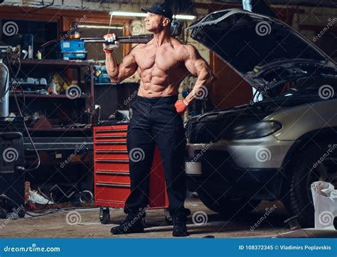 Shirtless Mechanic In A Garage Stock Image Image Of Station Engine