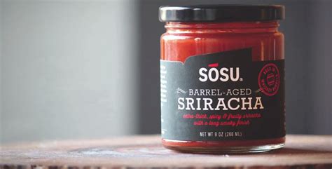 sriracha aged in whiskey barrels by sosu sauces cool material