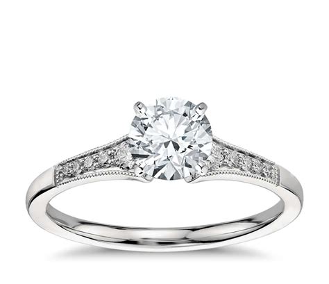Contouring, notching, and a contouring and notching combination. Graduated Milgrain Diamond Engagement Ring in Platinum (1 ...