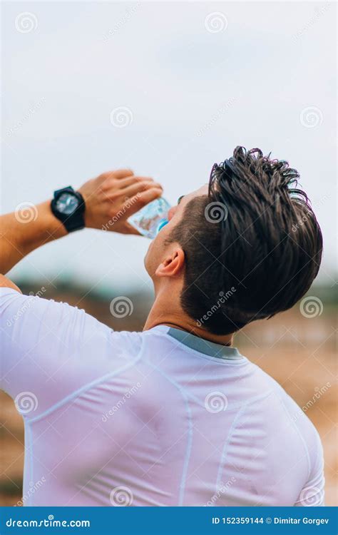 A Man Drinking Water During His Exercise Stock Photo Image Of Healthy