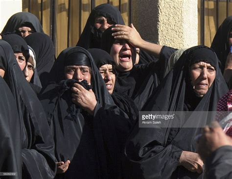 iraqi women grieve during the funeral of sunni arab tribal leader khadim sarhid al hemaiyem on