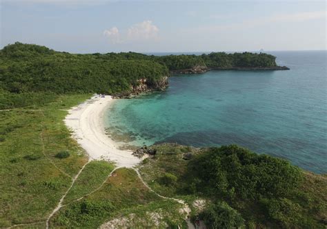 Carnaza Island Cove Hopping Haven In Cebu Vivomigsgee