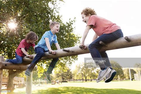 Boys Playing In The Park Stock Photo Getty Images