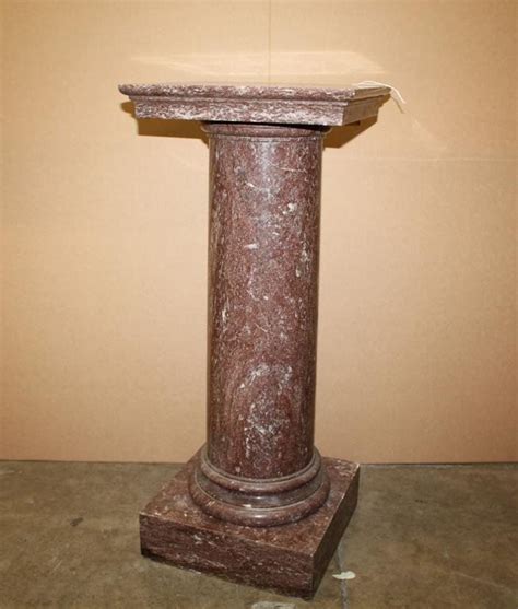 Antique Marble Pedestal With Roseburgundy Colorations And Classic Ancient