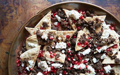 Spiced middle eastern lamb patties with pita and yogurt. Party Fare: Middle Eastern Lamb Nachos | Food, Recipes, Lamb