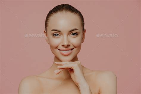 Woman Touches Chin Gently Enjoys Flawless Of Skin After Beauty
