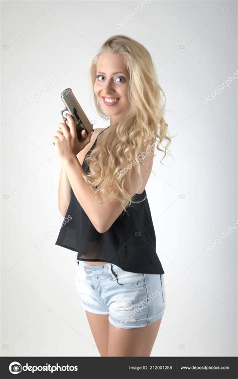 Silahlı Seksi Kadın Stok fotoğrafçılık muro Telifsiz resim 212001288