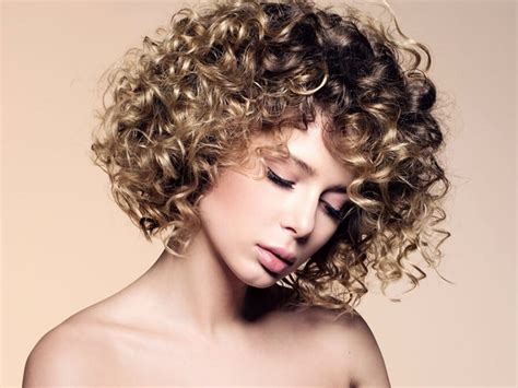 Integrating varied gold and black hues in this perm hair enhances the curly nature. 15 Gorgeous Short Permed Hairstyles for Women - WeTellYouHow