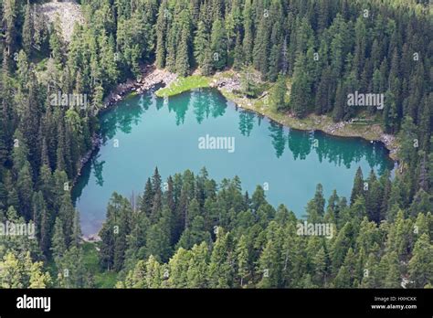 A Beautiful Secluded Mountain Lake Surrounded By Forest Turquoise