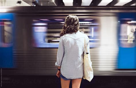 Girl Waiting For Her Train Del Colaborador De Stocksy Aila Images