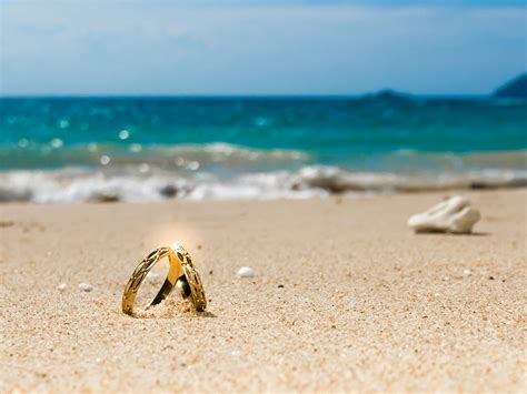 Nutritional value for 100 gr displayed. Honeymoon on tropical island, two wedding rings on the ...