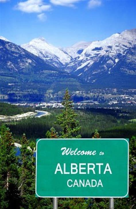 Welcome To Alberta Canada Highway Sign In Front Of The Rocky